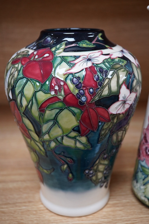 A Moorcroft ‘Nostalgia’ pattern vase together with a similar ‘Foxglove’ pattern ewer, 24.5cm. Condition - good, some crazing